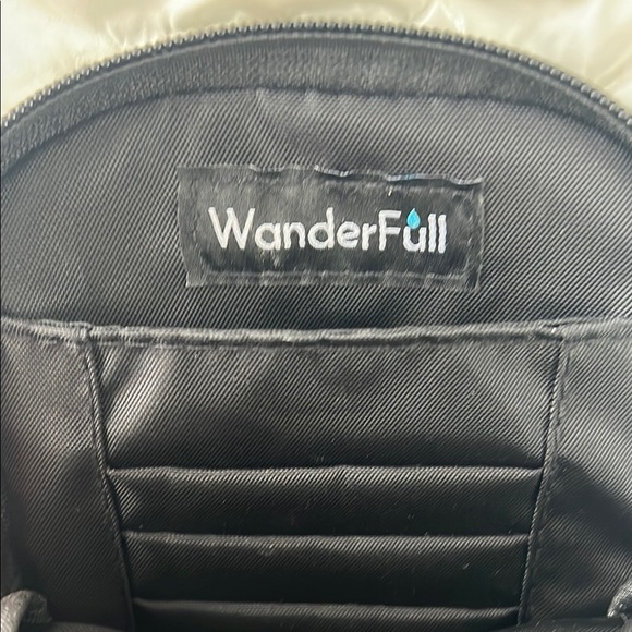 Chic Black and White Quilted Crossbody Bag with Striped Strap - Picture 5 of 7